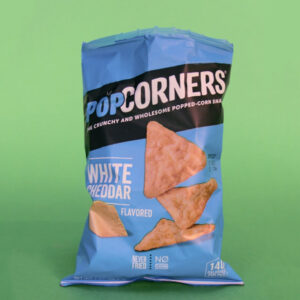 Popcorners bag in front of green screen